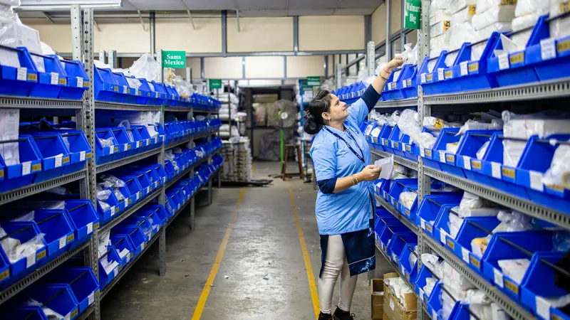 How to manage inventory in a retail shop — warehouse worker counting stock on shelves